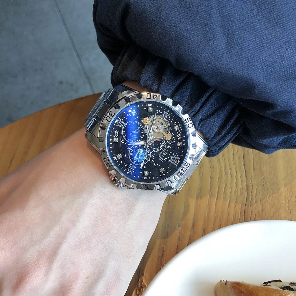 Men's silver case automatic mechanical watch with black starry dial, luminous hands and genuine leather strap