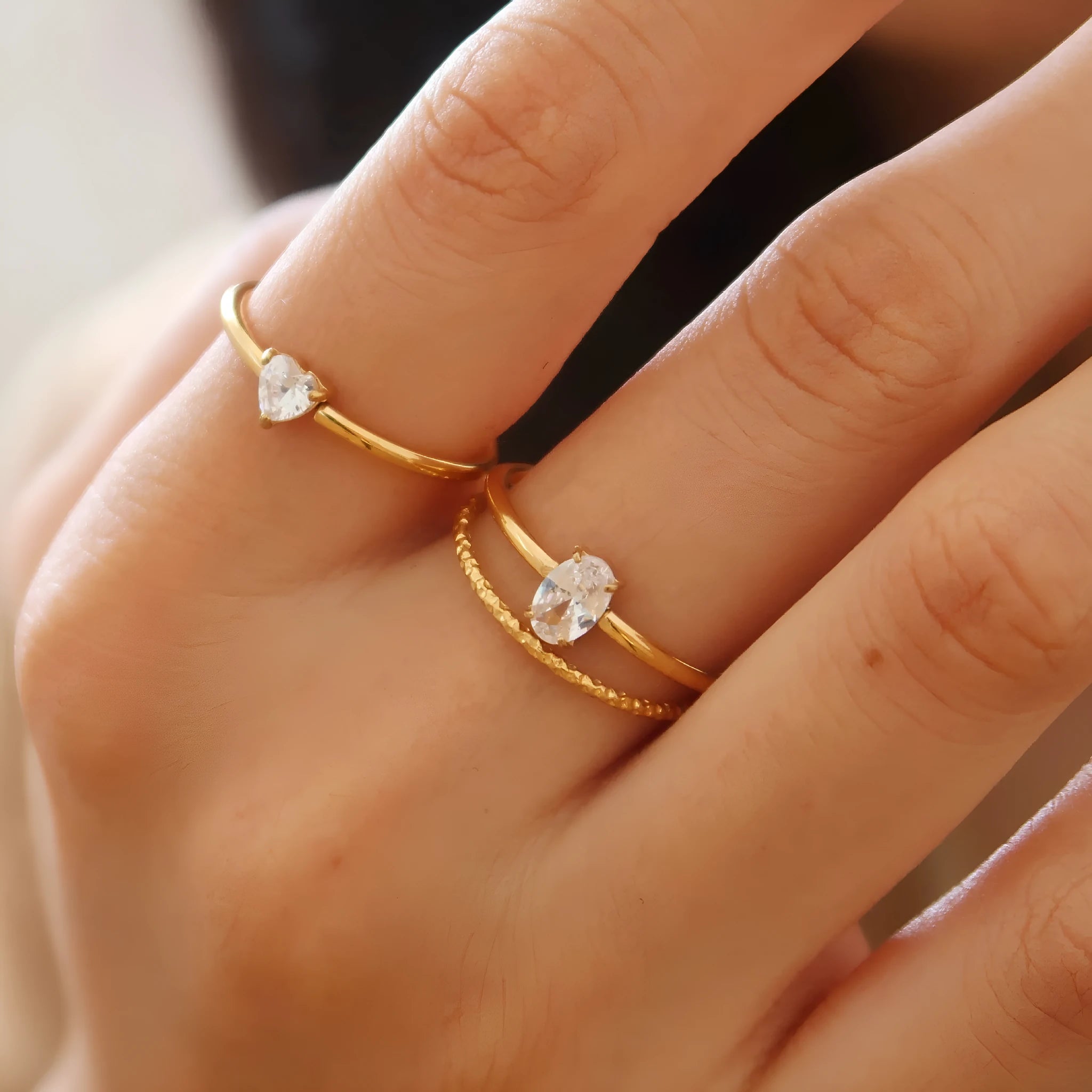Golden stainless steel women's ring with love heart or oval centrepiece in sizes no.5 to no.8
