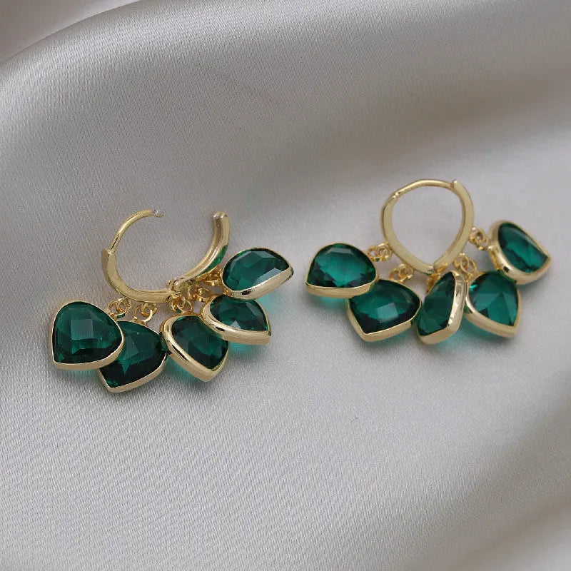 Korean style green heart pendant glass ear clips with copper construction and alloy inlay detailing