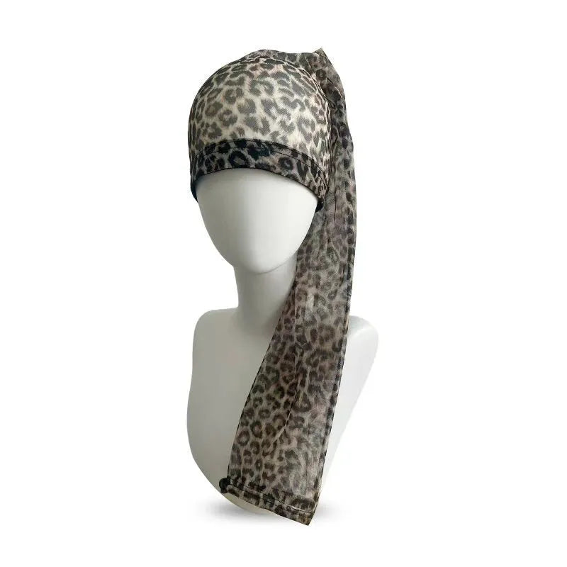 Breathable spandex mesh wig cap shown in multiple colour options including black, brown, leopard, and pastels.