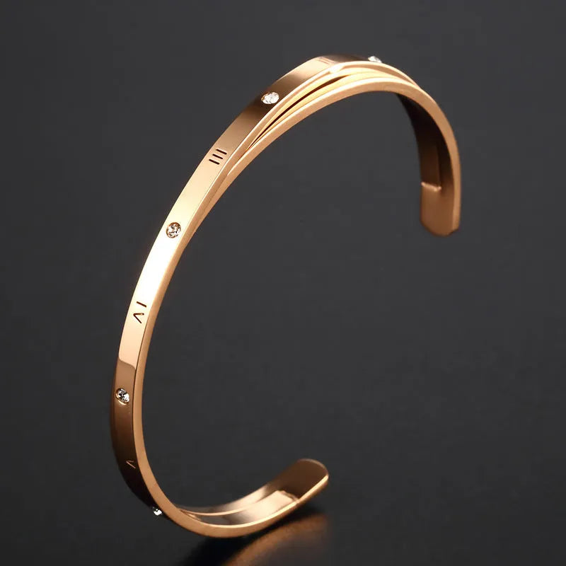 Open-ended women's bracelet with inlaid zircon stones on wrist