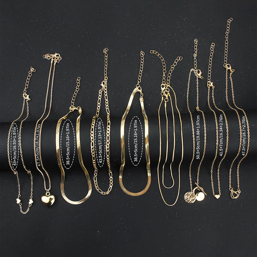 Women's gold electroplated necklace set with ten alloy pendants on adjustable snake bones chain