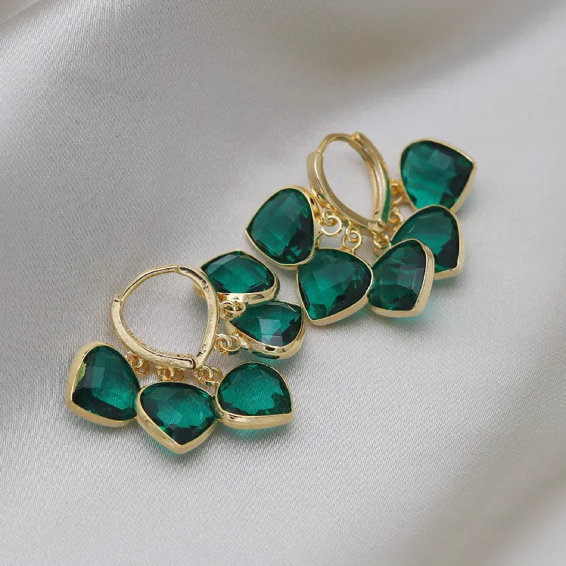 Korean style green heart pendant glass ear clips with copper construction and alloy inlay detailing