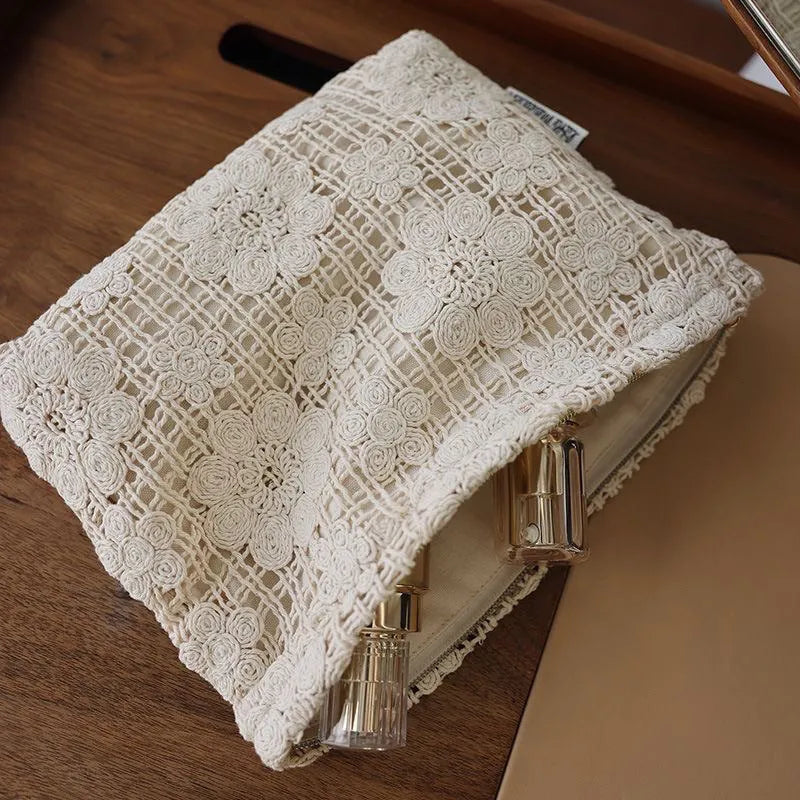 Handmade crocheted hollow flower cosmetic bag with ethnic embroidery on corduroy fabric