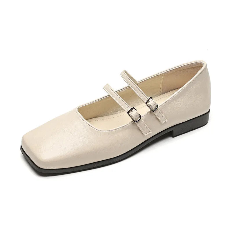 Women's silver genuine leather Mary Jane shoes with a cross buckle strap and low flat heel.