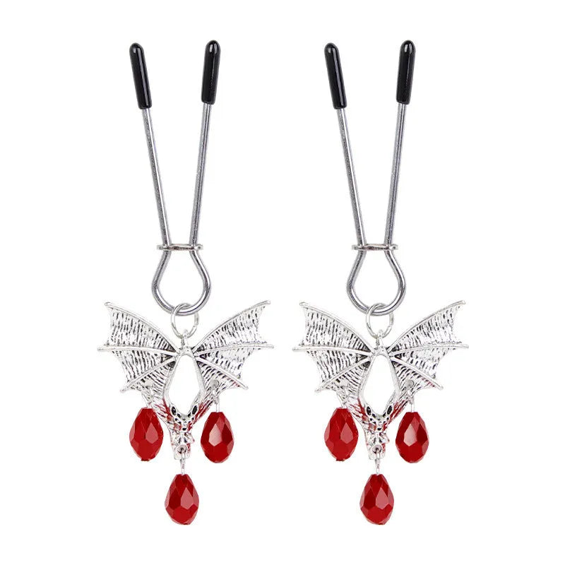 Silver alloy bat nipple clamp with ruby design showing adjustable pressure mechanism