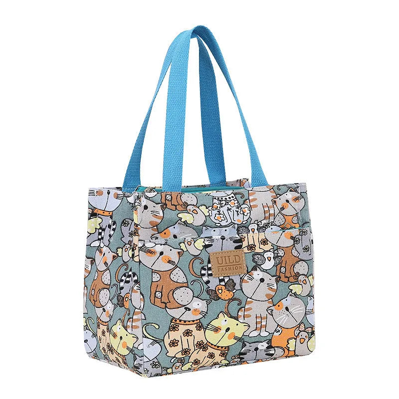 Women's printed canvas bag with aluminium frame showing floral pattern design and horizontal square shape
