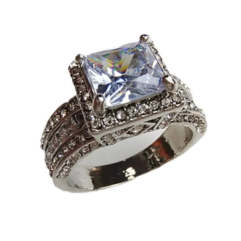 Women's geometric fashion ring with round elements in silver-colour electroplated finish