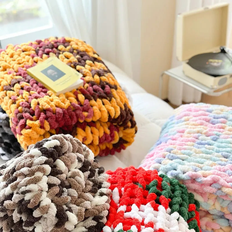 Thick striped chenille blanket in a choice of four colours, shown laid flat displaying its 130x170cm size.