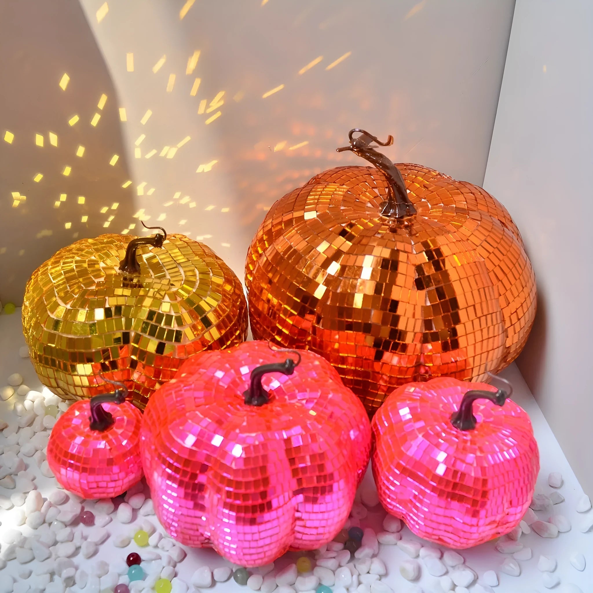 A Chinese-style glass pumpkin ornament with a mirror finish, shown in one of five available sizes.