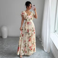 Apricot floral print women's dress with V-neck, ruffled sleeves, and oversized swing skirt