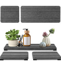 Set of three square diatomite bathroom countertop drying mats in solid grey colour.