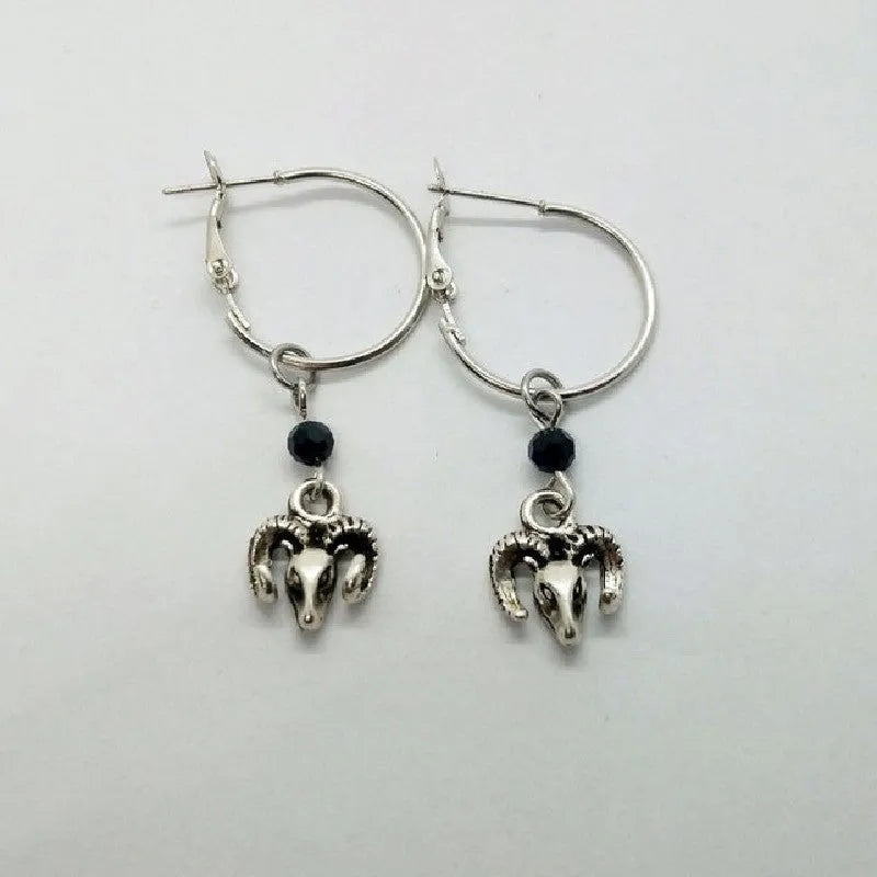 Silver round ring earrings with Tibetan antelope design and alloy construction