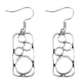 Geometric earrings with irregular square and round design in antique silver colour