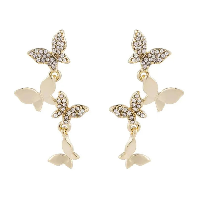Gold colour copper butterfly earrings for women with four butterfly drop design