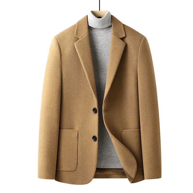 Men's slim fit wool suit jacket in grey shown on a model, suitable for autumn and winter wear.