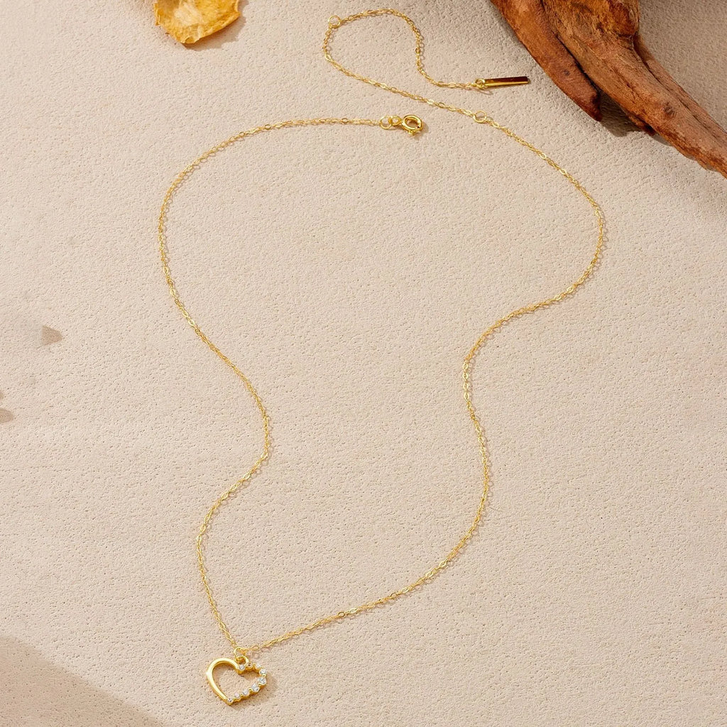 Sterling silver hollow heart necklace for women with gold plating options