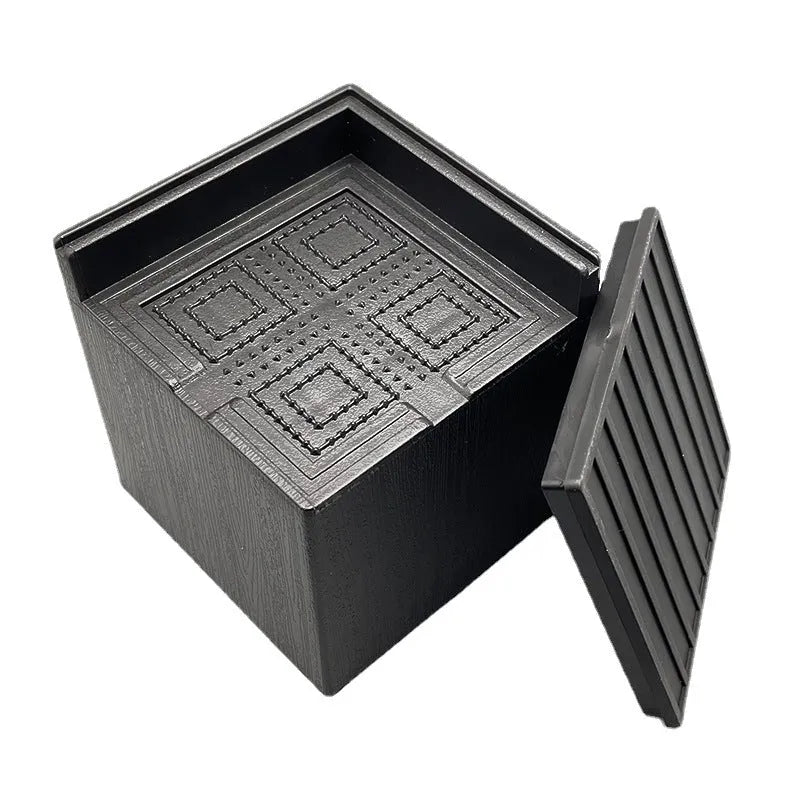 Four black plastic furniture foot mats for increasing bed and sofa height