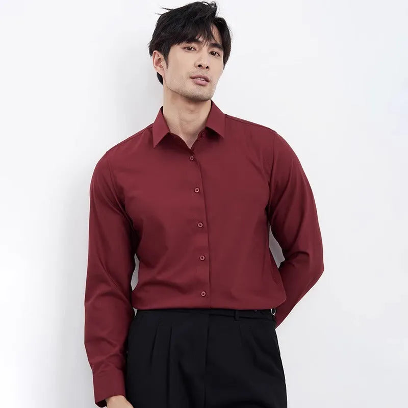 Men's wine red slim fit long sleeve shirt made from non-iron polyester blend fabric.