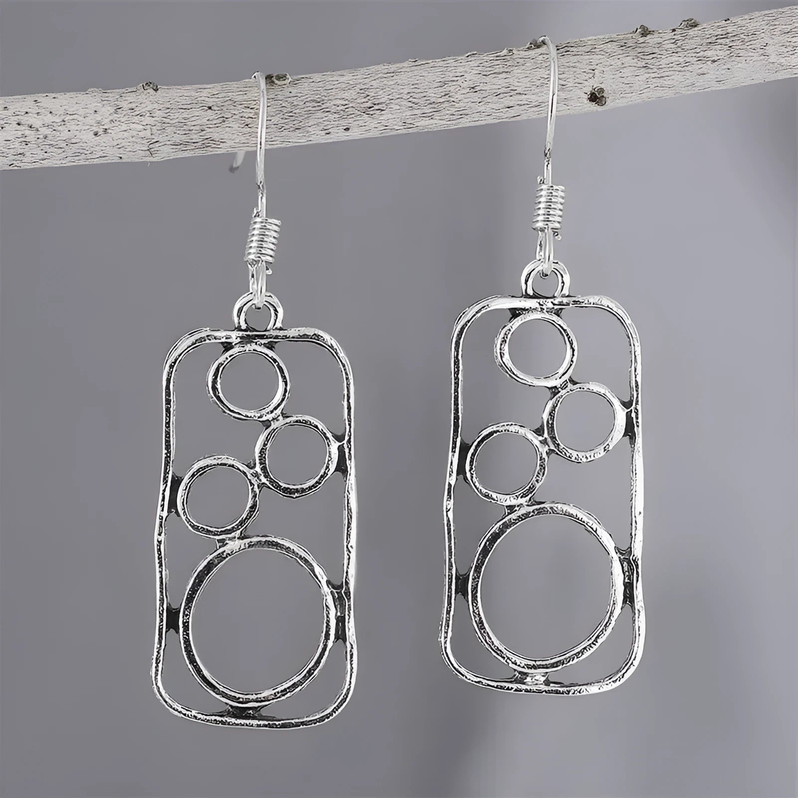 Geometric earrings with irregular square and round design in antique silver colour