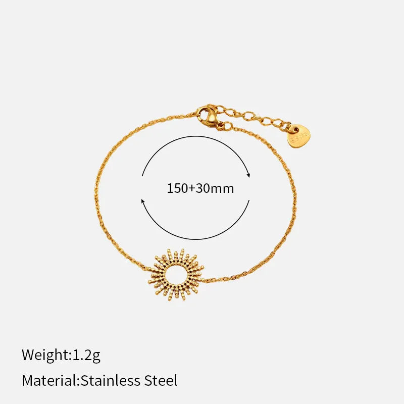 Gold geometric necklace and bracelet jewellery set with chain elements and Y-shaped pendant