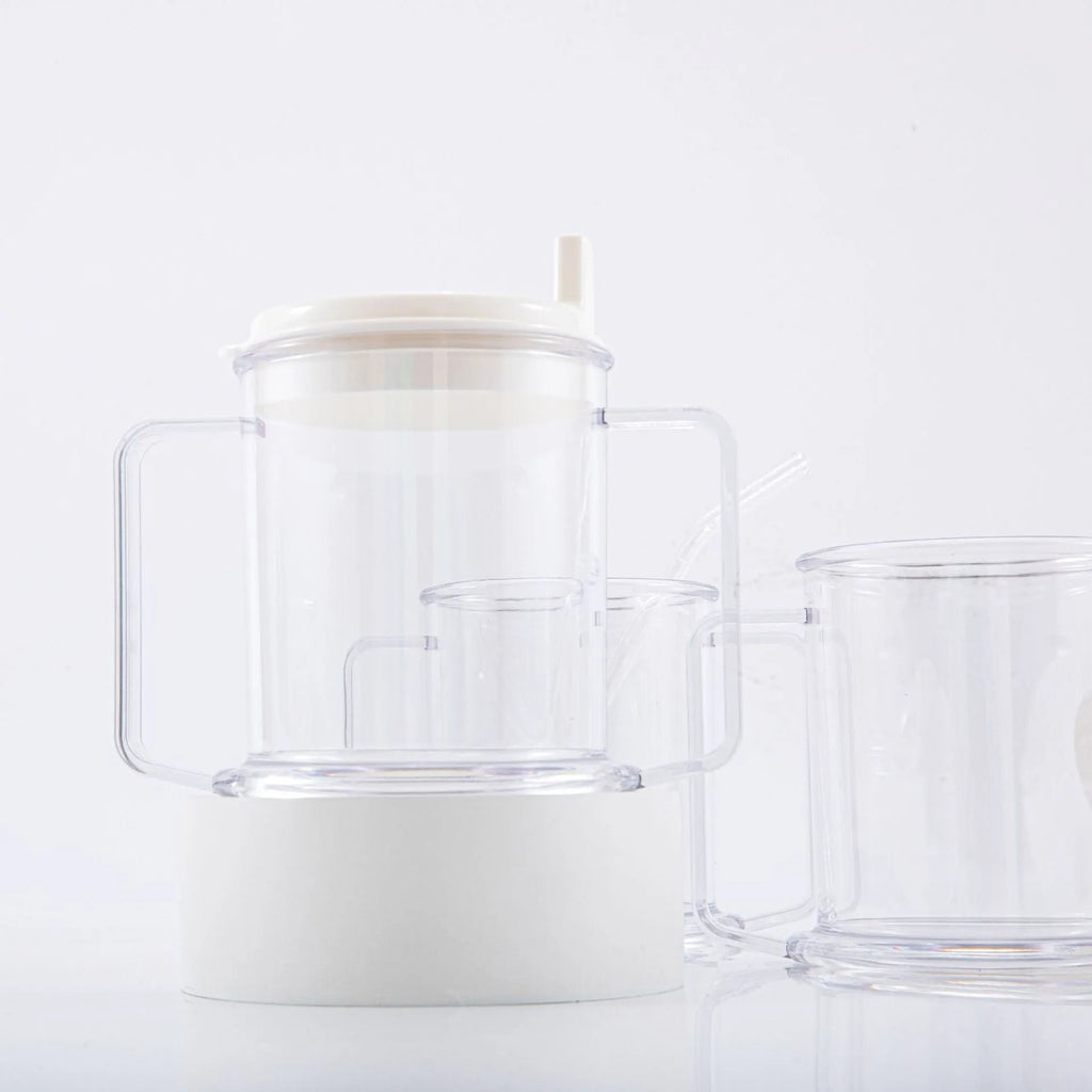 Transparent lightweight plastic drinking cup with spill-proof design on a plain background