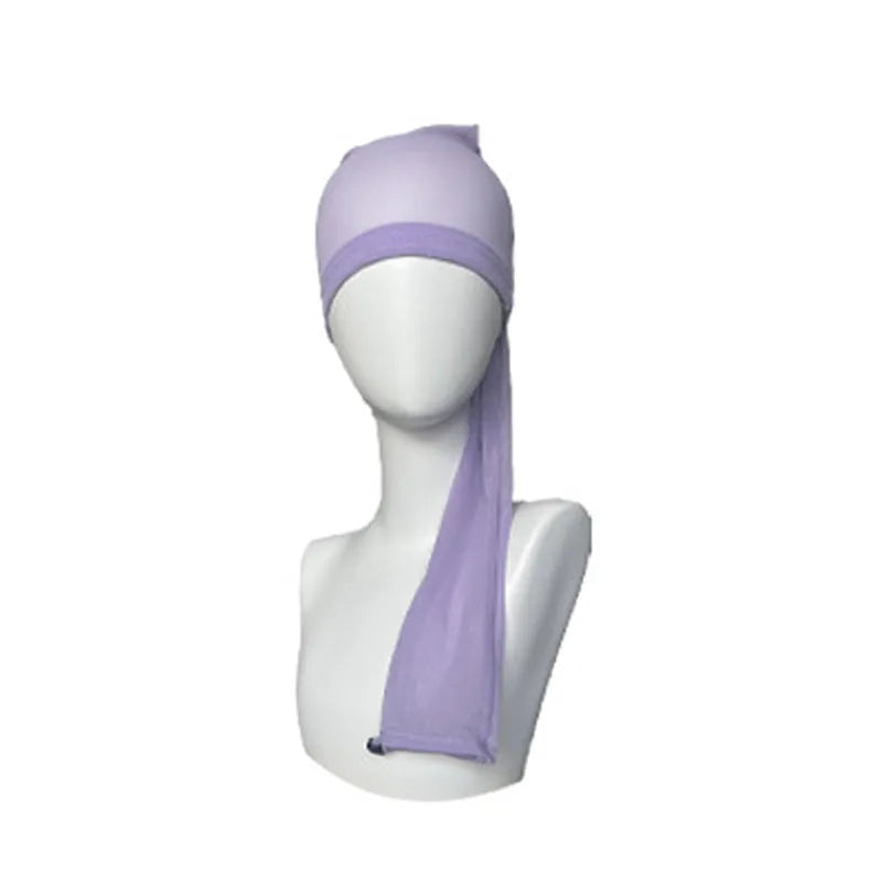 Breathable spandex mesh wig cap shown in multiple colour options including black, brown, leopard, and pastels.