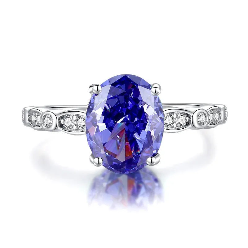 Heart-shaped sterling silver ring with a faceted ice flower cut zircon stone in a Tan Sang colour tone.