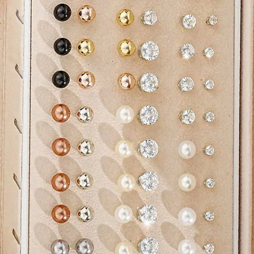 108 geometric alloy earrings with electroplated gold and yellow finishes showing round design elements