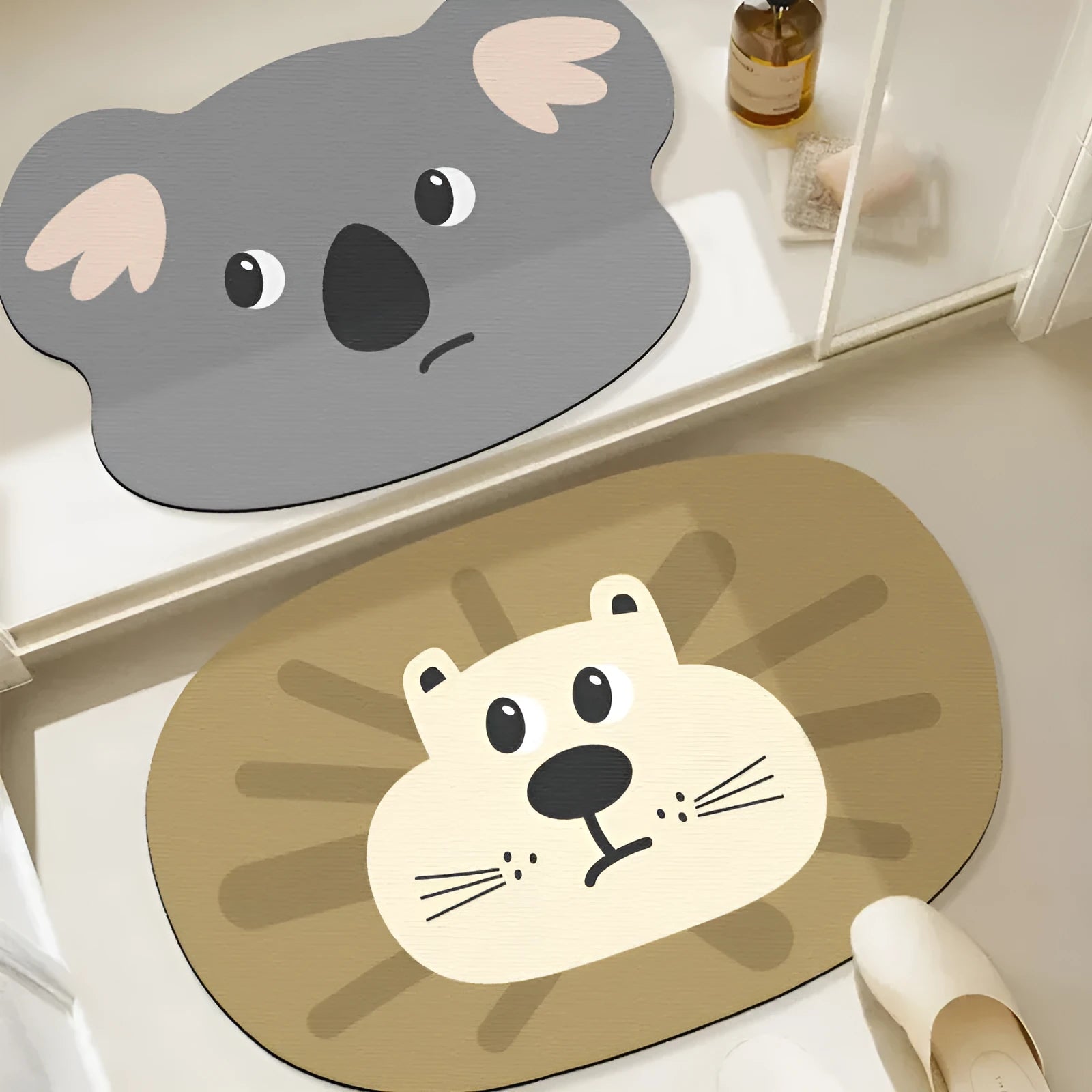 Cartoon animal diatomite bathroom mat in alien shape on tiled floor.