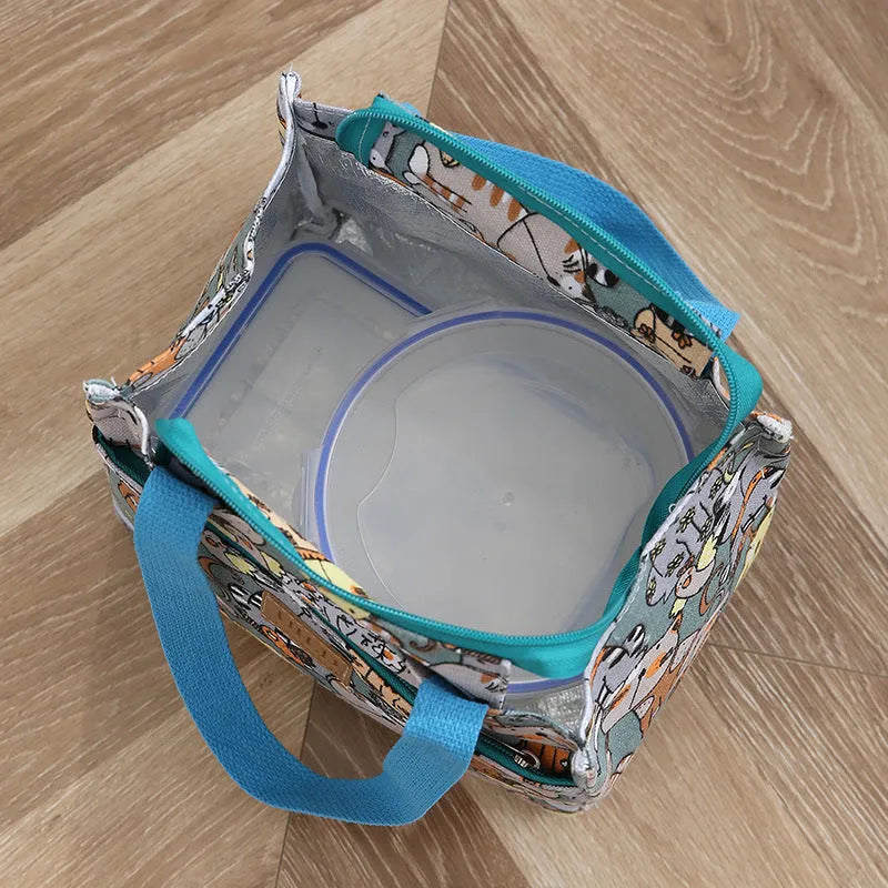 Women's printed canvas bag with aluminium frame showing floral pattern design and horizontal square shape