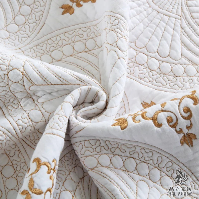 European-style pure cotton embroidered bed cover set with two pillowcases on a bed