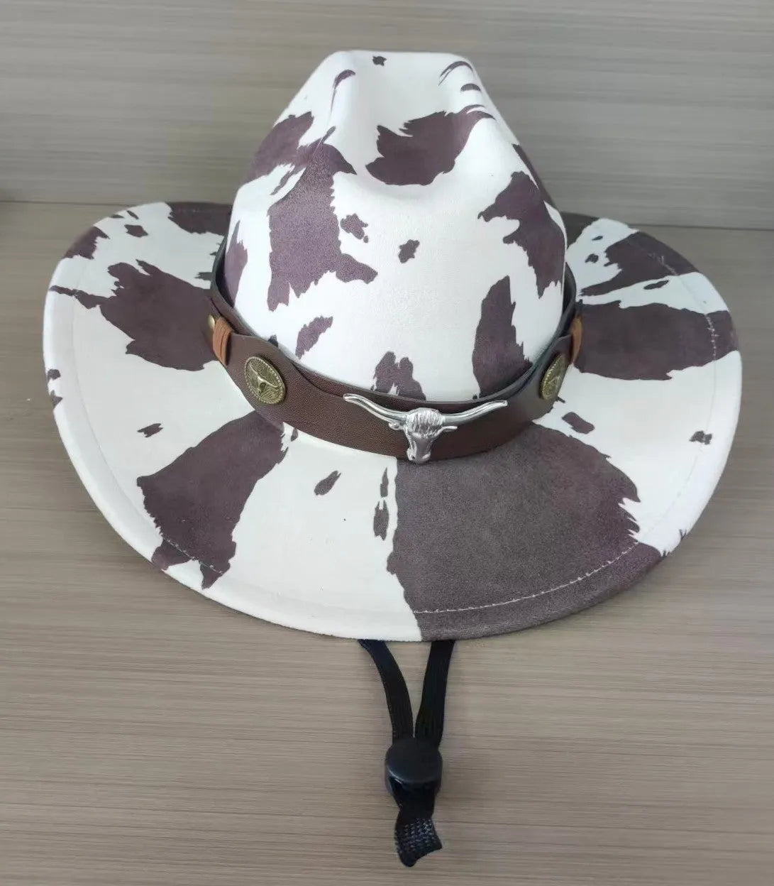 Brown leather velvet western cowboy hat with curved edge and conical crown style