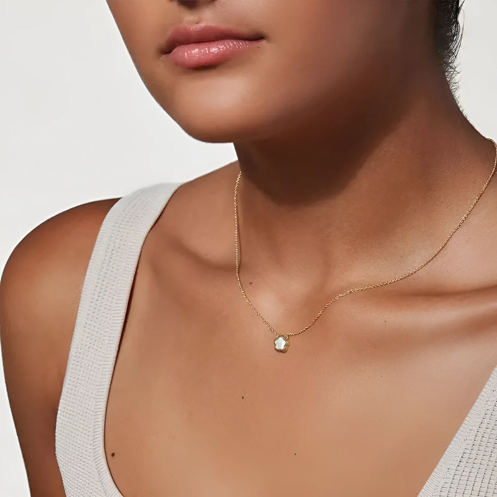 White mother shell flower necklace with floral pendant and O-shaped chain in gold or silver finish