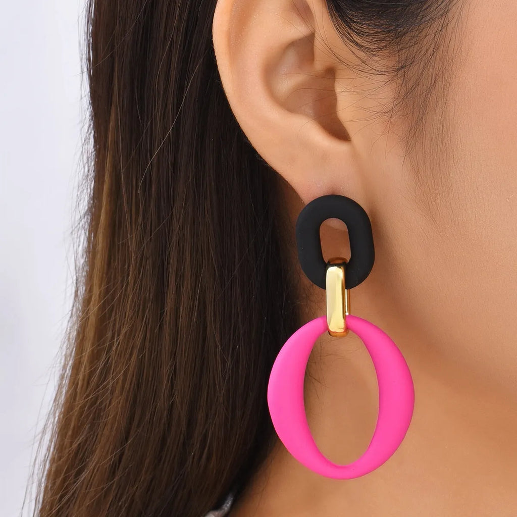 Geometric exaggerated hoop earrings in acrylic with retro style, clip-on fitting, alloy posts, available in assorted colours, 6cm diameter