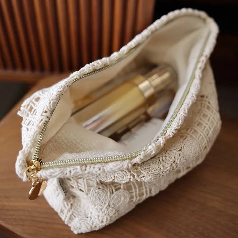 Handmade crocheted hollow flower cosmetic bag with ethnic embroidery on corduroy fabric