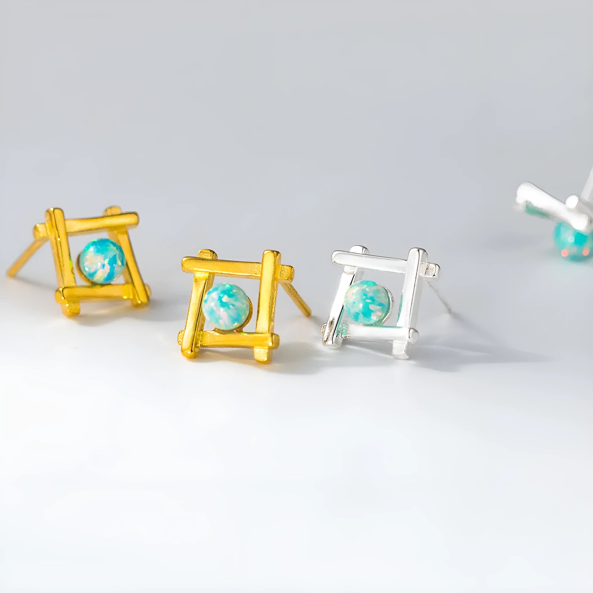 Geometric cross quadrangle stud earrings in 925 silver with silver and gold tone options