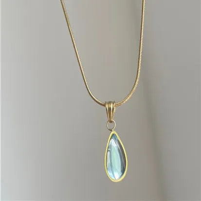 Retro blue and green water drop necklace with gemstone inlay on a titanium steel snake bone chain.