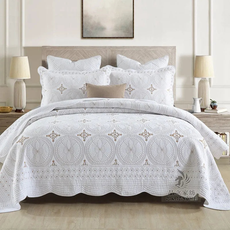 European-style pure cotton embroidered bed cover set with two pillowcases on a bed
