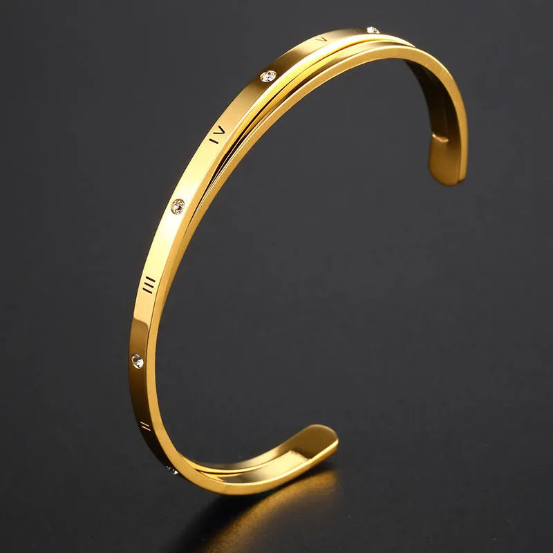 Open-ended women's bracelet with inlaid zircon stones on wrist