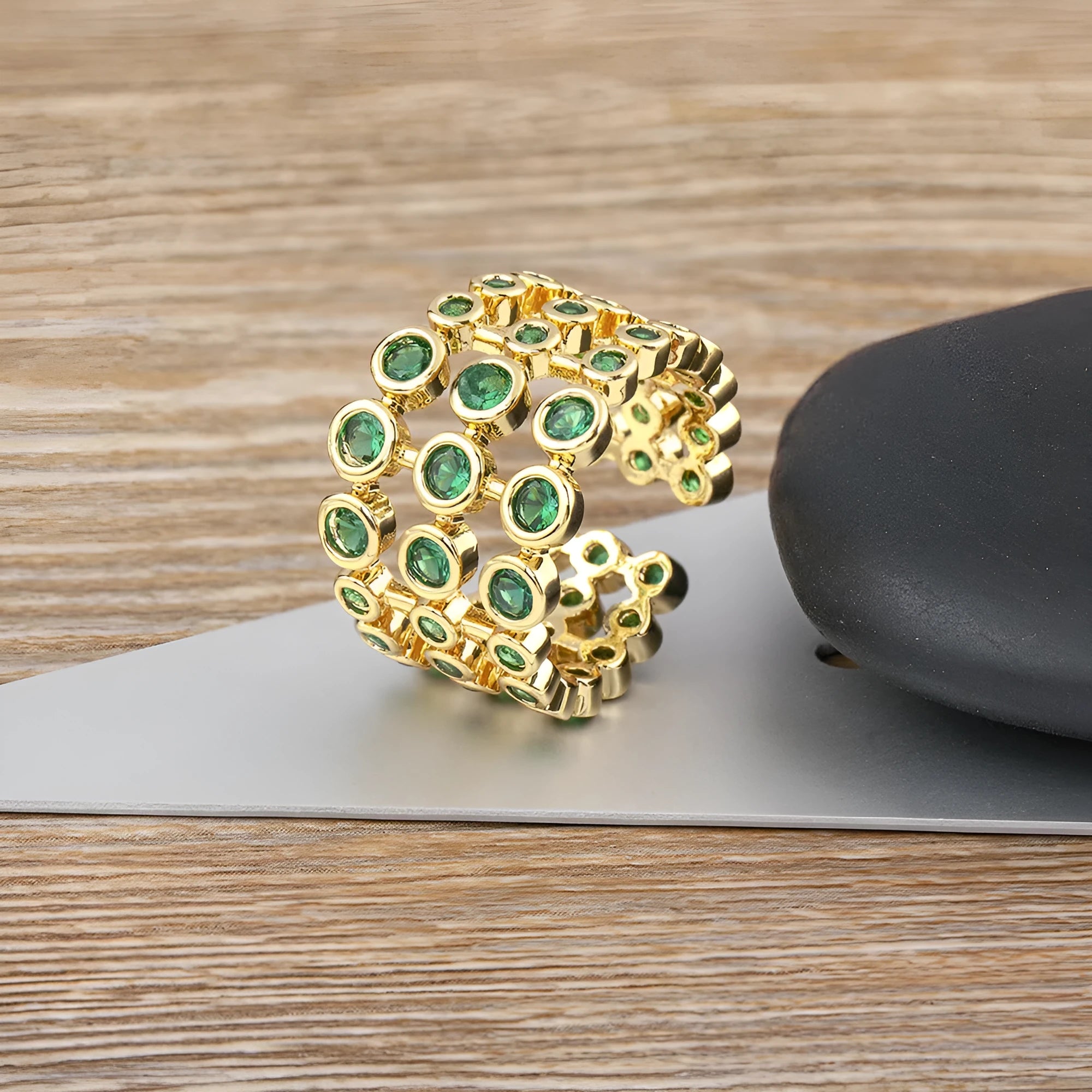 Copper ring with 18K gold plating and green zircon accents in wide band three-layer design