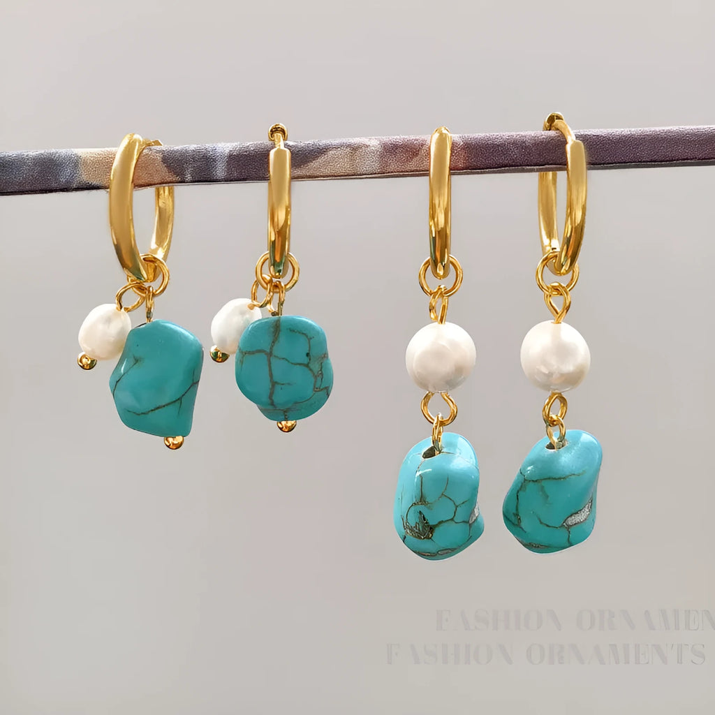 A pair of short and a pair of dangle geometric turquoise copper earrings.