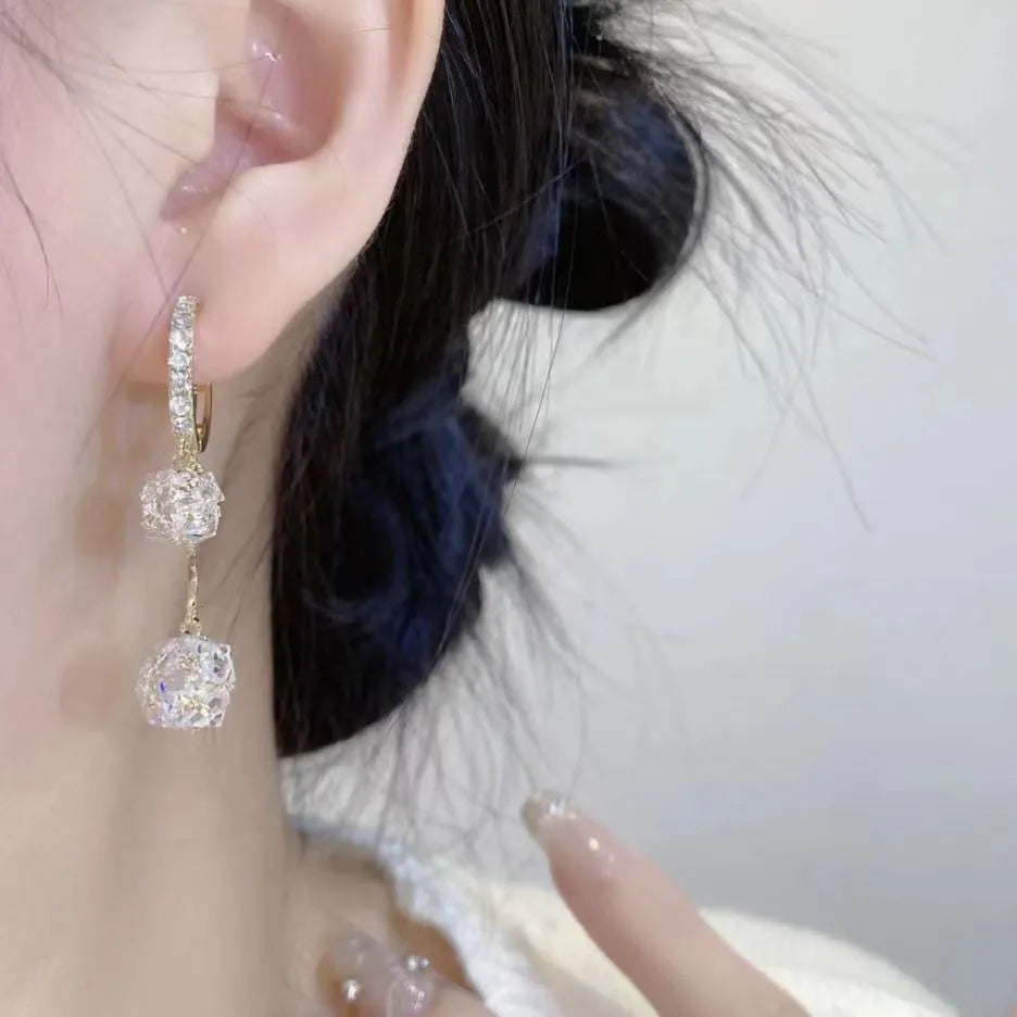 Silver drop earrings with tassel balls and rhinestones on confession balloon double pendant design