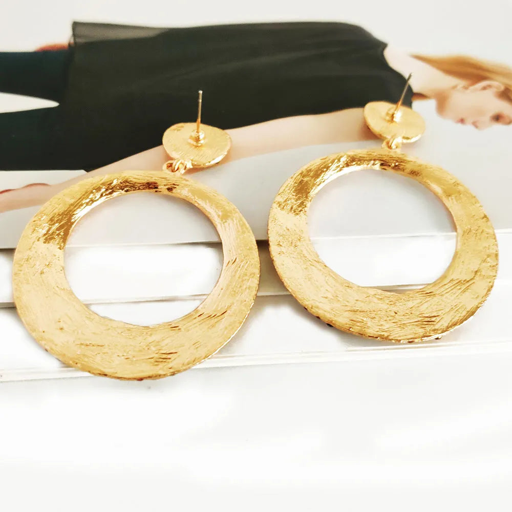 Large round metal earrings with diamond pattern and colourful cartoon design for women