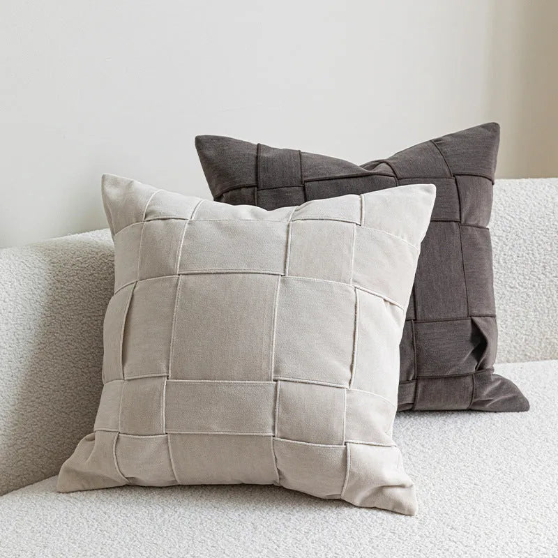 Square 50x50cm chenille woven decorative pillow in beige colour with textured fabric.