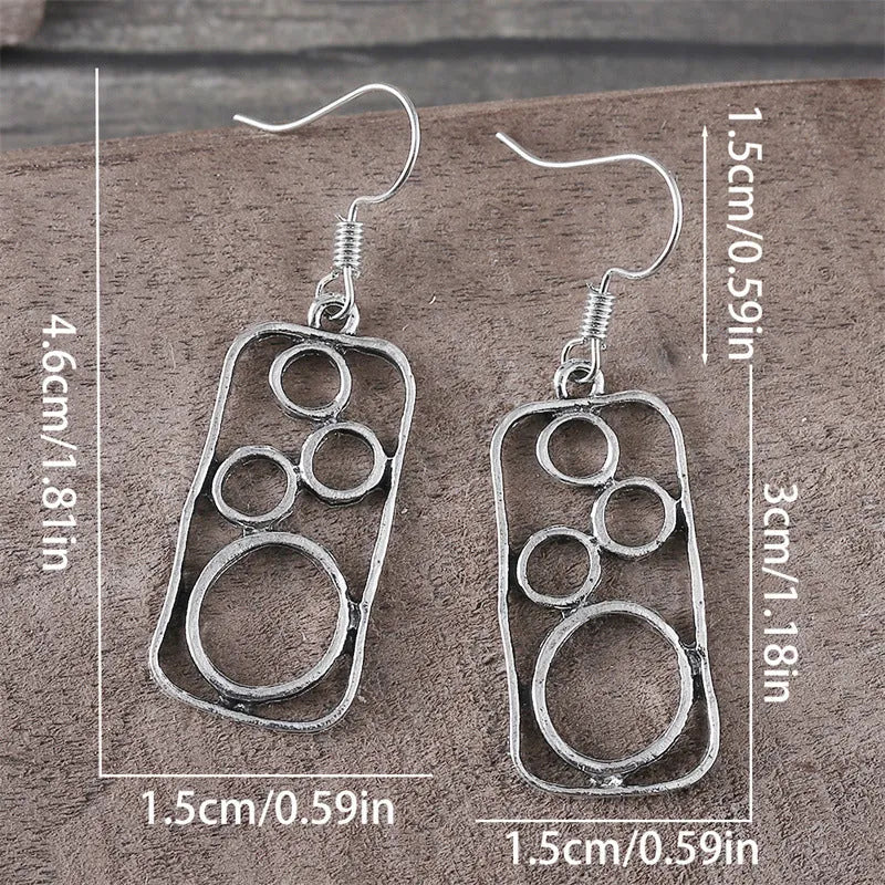 Geometric earrings with irregular square and round design in antique silver colour