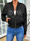 Black women's semi-transparent casual jacket with geometric pattern and front zipper.