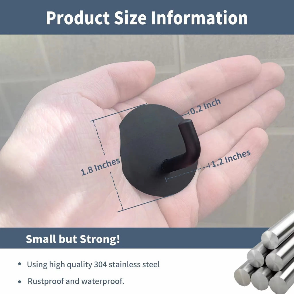 Stainless steel round self-adhesive hook for wall mounting.