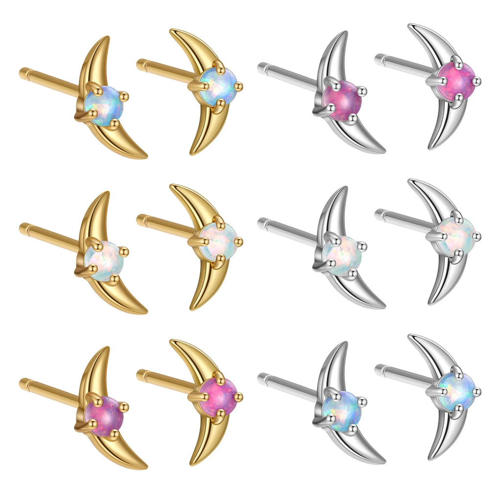 A pair of geometric drop earrings made from 925 silver with a coloured cubic zirconia stone.