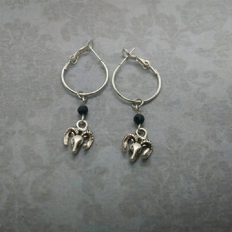 Silver round ring earrings with Tibetan antelope design and alloy construction